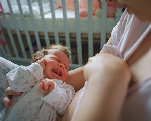 Baby with colic, may have a lip or tongue tie