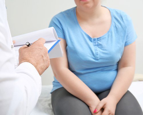 overweight woman at doctor