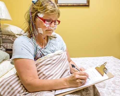 woman getting sleep apnea test