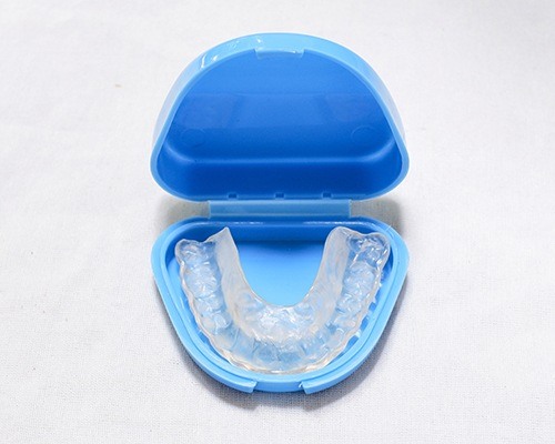oral appliance in blue case