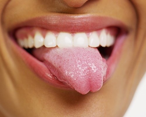 woman sticking tongue out