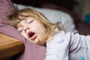 little girl sleeping with mouth open